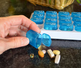Monthly AM PM pill organizer! 2 sets of 31 Daily pill boxes in a tray - organize your twice a day medications for the entire month. Great gift for parents and grandparents. Take one out and keep in your pocket or purse to take meds later.
